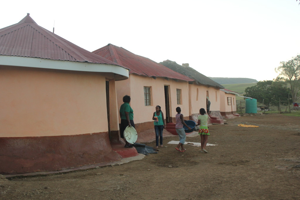 Mumma in her yard with the children